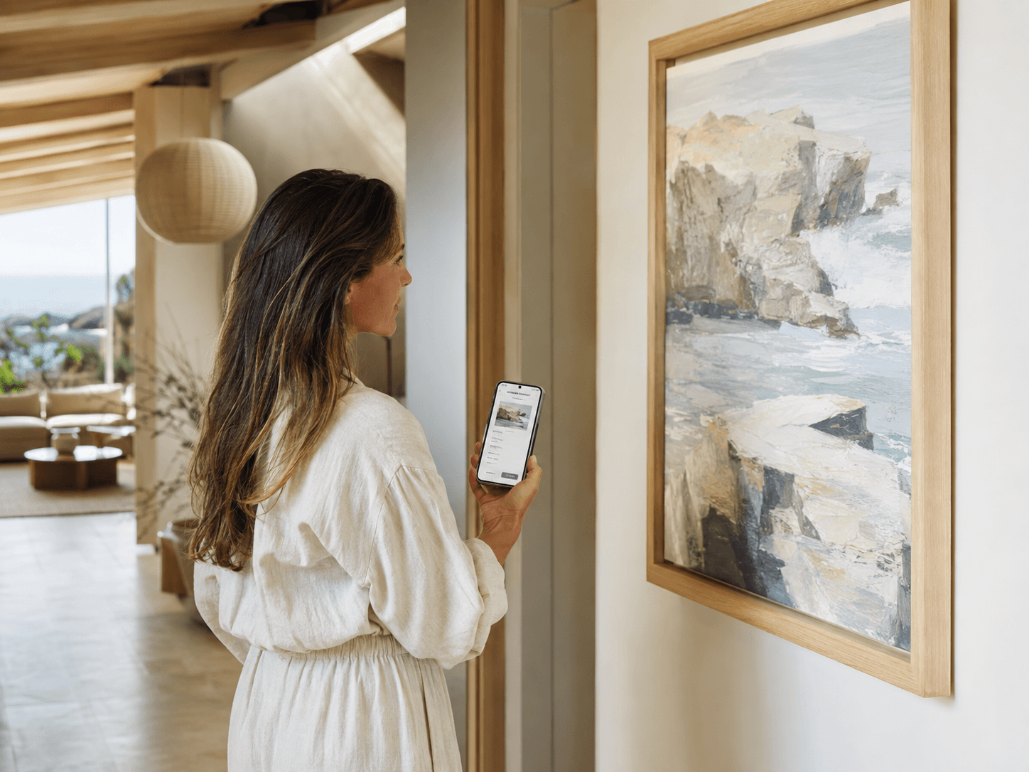 A collector viewing an artwork and its digital passport at home